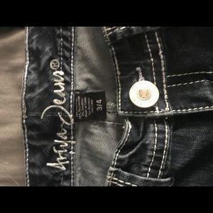 Ariya Dark Wash Jeans with silver stitching, 3/4.